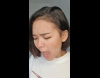 Girl touches black flat iron burns finger 