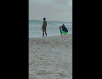 Man red briefs face beach ocean pictorial