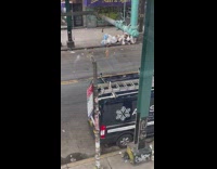 Pizza hangs above sidewalk 