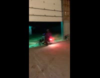 Guy rides ATV runs over the bike