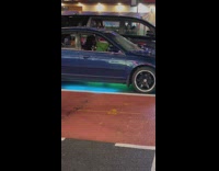 Grinch on car dancing to hip hop christmas music