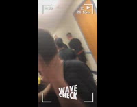 Guy slaps hits neck friend army hallway 