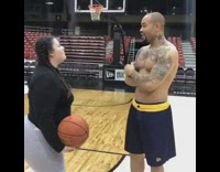 Guy makes bet with girlfriend, if she makes a basketball shot she goes through is phone, guy slaps and blocks ball