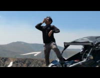 Guy shotguns beer black dune buggy mountain 