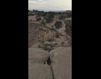 Guy sing and dance nsync over rocks