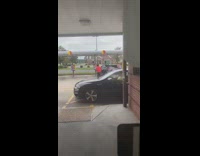 Guy serving food on roller skates falls 