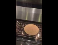 Girl pizza oven cardboard burning