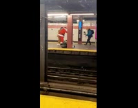 Santa and reindeer dance subway station platform 