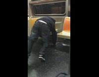 Man Asleep on Subway Falls In Crack Between Seats