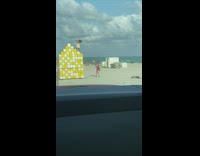 Woman stand over white yellow blocks beach
