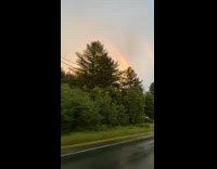 Lightning Strikes in Sky Between Two Rainbows Part 2