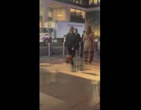 Two women dances middle of the street