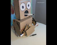 Robot tries to pick up pen cap