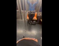 Man concrete block on lap pull ups in train