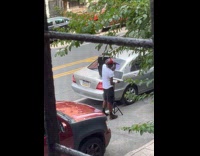 Collab WINY - Man DJ-ing on the side of street 