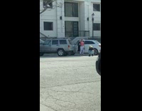 Woman pink shirt photo shoot car window