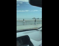 Woman white top milktea drink pictorial beach