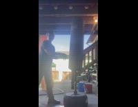 Boy punches punching bag and bounces back to his head