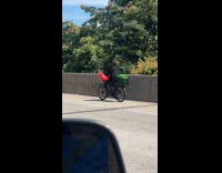 Collab WINY - Delivery guy ride electric bike on highway