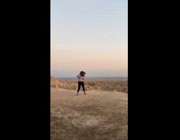 Girl dinosaur mask grey sweater dance badlands