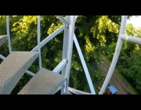 Blue spiral staircase view day time trees