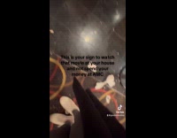 Woman shows pile trash at movie theater