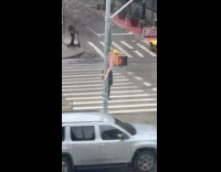 Submitter shows body hang on signal post