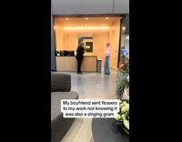 Girl receives singing gram valentines