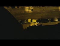 White car successfully leaves from the parallel parking on the street