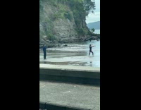 Woman in black pick outfit martial arts practice