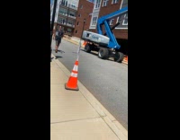 Collab IITW - Man wear live stream equipment walk street