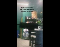 Guy walks past bodega selling sneakers 