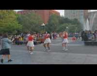 Group of five dance at park to kpop for video