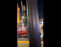 Woman pretending to hit head on pole 