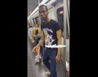 Contortionist man dance bend arms inside train