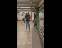 Street performer gets small boy to dance and mimic him