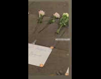 People lights candles for the victims in China