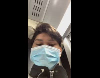 Guy on bus emergency mylar foil blanket 