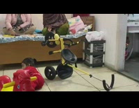 Little girl plays and fell on the bicycle