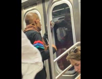 Man using scissor and sidemirror for trimming