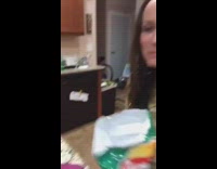 music girl yellow shirt eating chips and spilling them 