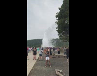 Parents carries their children for a selfie at the geyser