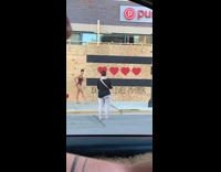 Woman ballet dance closed store Black Lives Matter