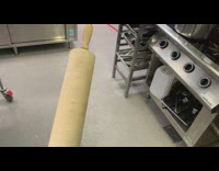 Rolling pin with ball bearings spin continuously