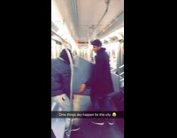 Guys bring grey couch onto subway 