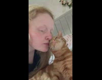 Lady Chirps at Cat and Licks her Nose