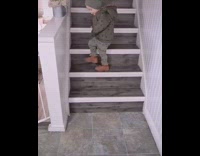 Baby boy stair shuffle challenge