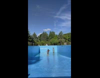 Girl slip on swimming pool shallow water