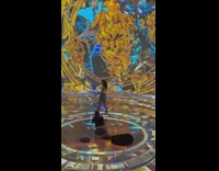 Woman in white tube top poses at the stage