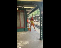 Collab WINY - Woman cone on head twerk dance train station